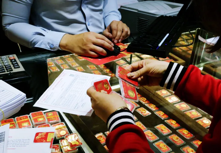 Đà lên giá đồng USD tạo sức ép cho giá vàng - Ảnh 1. Đà lên giá đồng USD tạo sức ép cho giá vàng - Ảnh 1.