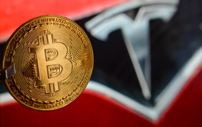 Elon Musk trở mặt với Bitcoin - Ảnh 1. Elon Musk trở mặt với Bitcoin - Ảnh 1.