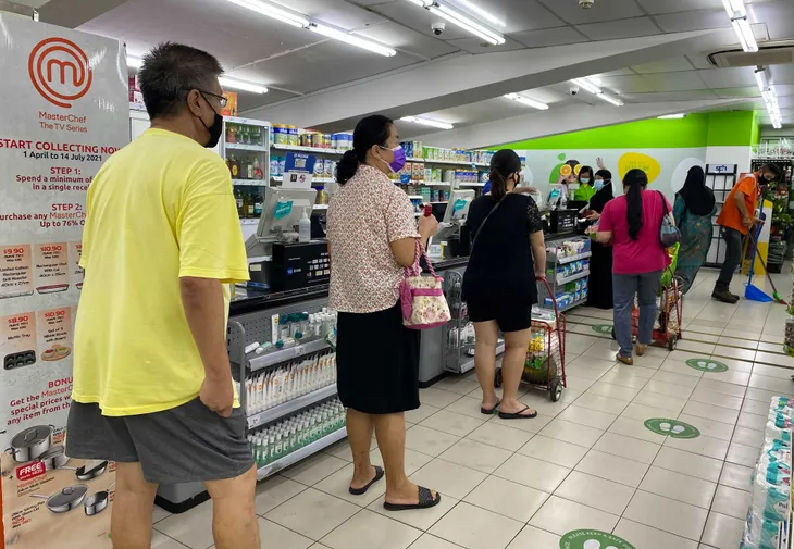 Singapore và Malaysia căng mình ứng phó với dịch COVID-19 - Ảnh 1. Singapore và Malaysia căng mình ứng phó với dịch COVID-19 - Ảnh 1.