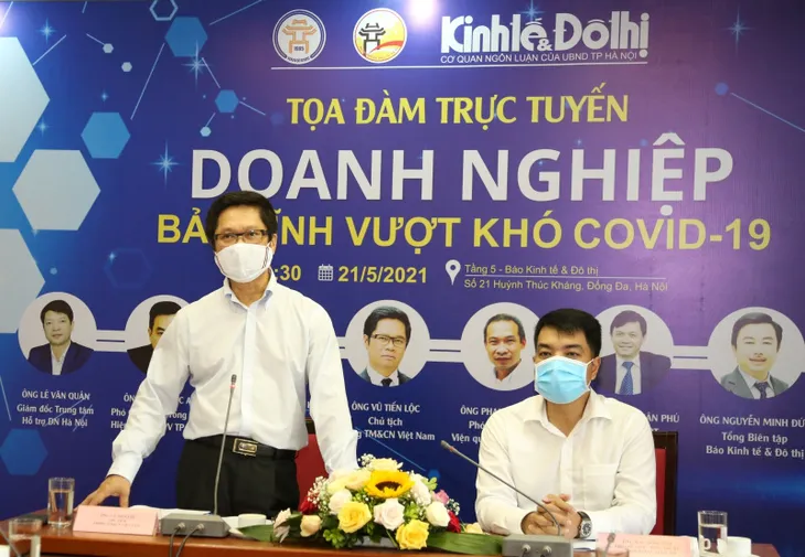 Hai liều vaccine COVID-19 cho doanh nghiệp Việt - Ảnh 1. Hai liều vaccine COVID-19 cho doanh nghiệp Việt - Ảnh 1.