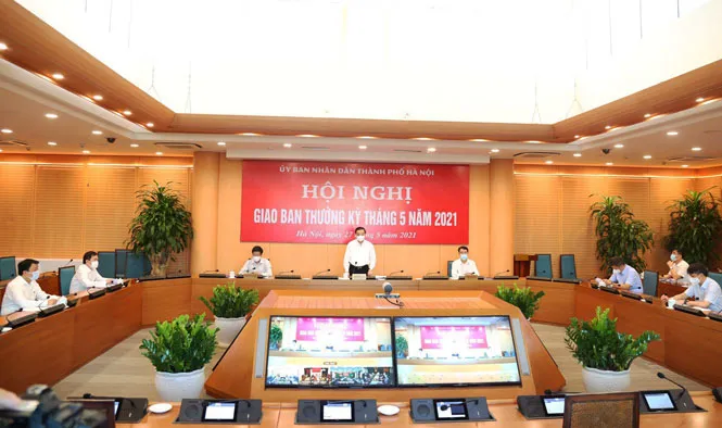 Hà Nội: Quyết tâm chiến thắng COVID-19, phấn đấu vượt chỉ tiêu tăng trưởng - Ảnh 1. Hà Nội: Quyết tâm chiến thắng COVID-19, phấn đấu vượt chỉ tiêu tăng trưởng - Ảnh 1.