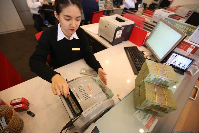 “Không bỏ trần hạn mức tăng trưởng tín dụng” - Ảnh 1. “Không bỏ trần hạn mức tăng trưởng tín dụng” - Ảnh 1.