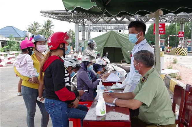 Tiền Giang tăng cường quản lý người, phương tiện đi về từ vùng dịch COVID-19 - Ảnh 2. Tiền Giang tăng cường quản lý người, phương tiện đi về từ vùng dịch COVID-19 - Ảnh 2.