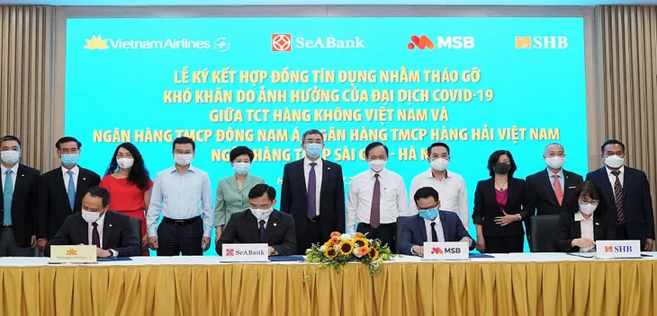 Ăn dè tiết kiệm, cõng thêm hàng hóa…, Vietnam Airlines tái cơ cấu vượt bão COVID-19 - Ảnh 2. Ăn dè tiết kiệm, cõng thêm hàng hóa…, Vietnam Airlines tái cơ cấu vượt bão COVID-19 - Ảnh 2.