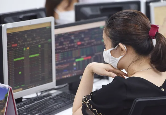 Tiếp đà phục hồi, VN-Index áp sát mốc 1.280 điểm - Ảnh 1. Tiếp đà phục hồi, VN-Index áp sát mốc 1.280 điểm - Ảnh 1.