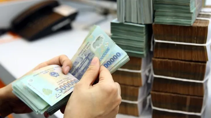Lãi suất huy động giảm, lãi vay ngân hàng vẫn cao - Ảnh 1. Lãi suất huy động giảm, lãi vay ngân hàng vẫn cao - Ảnh 1.