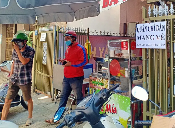 TP Hồ Chí Minh ‘mở lối’ cho người dân khi tạm dừng các dịch vụ ăn uống mang về - Ảnh 1. TP Hồ Chí Minh ‘mở lối’ cho người dân khi tạm dừng các dịch vụ ăn uống mang về - Ảnh 1.