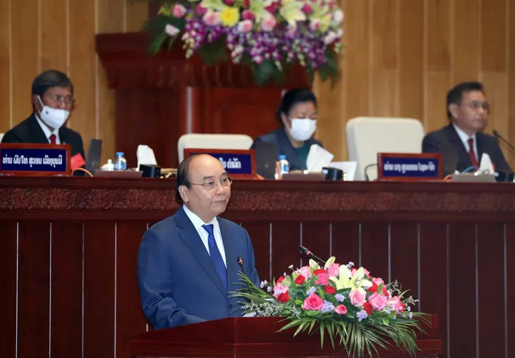 Chủ tịch nước: Người Việt Nam gọi nhân dân Lào là anh em một nhà, tình thân như ruột thịt - Ảnh 1. Chủ tịch nước: Người Việt Nam gọi nhân dân Lào là anh em một nhà, tình thân như ruột thịt - Ảnh 1.