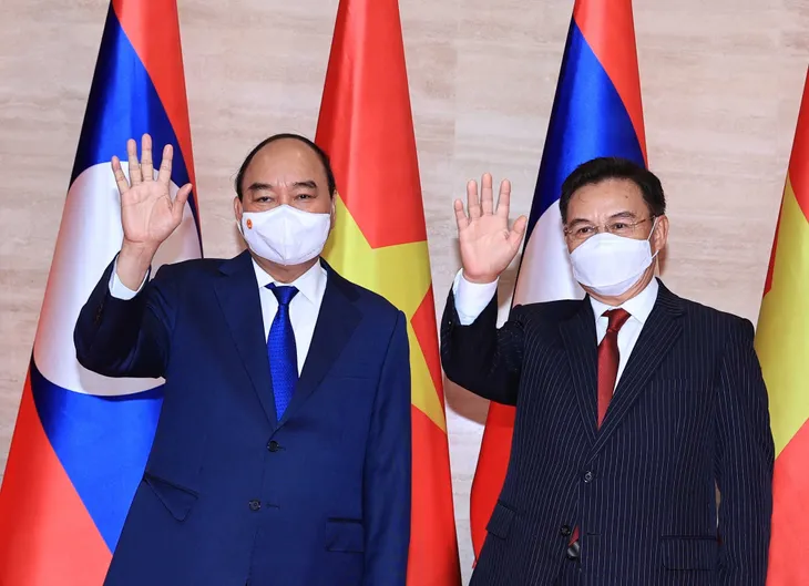 Chủ tịch nước: Người Việt Nam gọi nhân dân Lào là anh em một nhà, tình thân như ruột thịt - Ảnh 3. Chủ tịch nước: Người Việt Nam gọi nhân dân Lào là anh em một nhà, tình thân như ruột thịt - Ảnh 3.