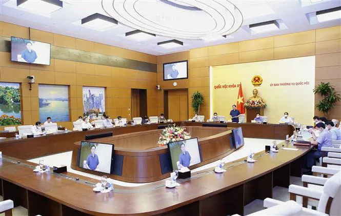 Nhất trí sử dụng ngân sách Nhà nước để chi trả toàn bộ chi phí khám chữa COVID-19 - Ảnh 1. Nhất trí sử dụng ngân sách Nhà nước để chi trả toàn bộ chi phí khám chữa COVID-19 - Ảnh 1.