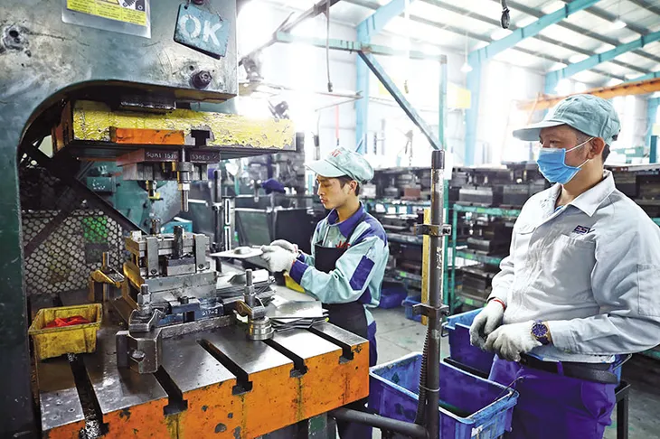 Nhiều nhà máy tại Bắc Ninh trở lại quỹ đạo sản xuất - Ảnh 1. Nhiều nhà máy tại Bắc Ninh trở lại quỹ đạo sản xuất - Ảnh 1.