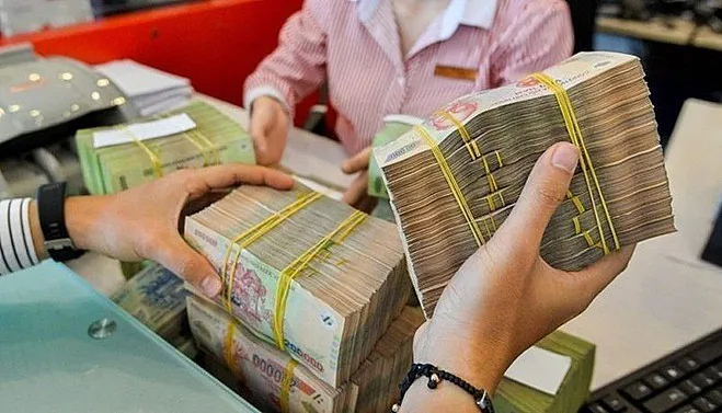 Ngành ngân hàng đang giải bài toán chưa có tiền lệ - Ảnh 1. Ngành ngân hàng đang giải bài toán chưa có tiền lệ - Ảnh 1.
