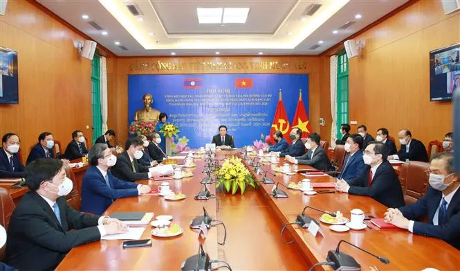 Tăng cường hợp tác trao đổi lý luận và đào tạo cán bộ Việt Nam - Lào - Ảnh 1. Tăng cường hợp tác trao đổi lý luận và đào tạo cán bộ Việt Nam - Lào - Ảnh 1.