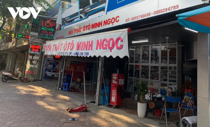 Sau giãn cách xã hội, nhiều gara ô tô tại Hà Nội thiếu thợ - Ảnh 1. Sau giãn cách xã hội, nhiều gara ô tô tại Hà Nội thiếu thợ - Ảnh 1.
