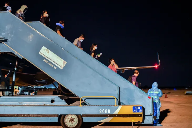 Vietnam Airlines khai thác chuyến bay quốc tế thường lệ đầu tiên kể từ đại dịch COVID-19 - Ảnh 1. Vietnam Airlines khai thác chuyến bay quốc tế thường lệ đầu tiên kể từ đại dịch COVID-19 - Ảnh 1.