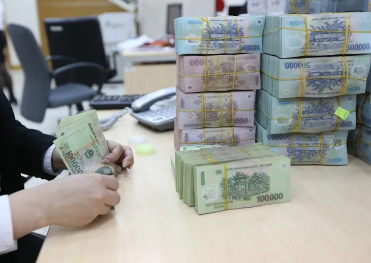 Tỷ giá linh hoạt giúp giảm nợ công - Ảnh 1. Tỷ giá linh hoạt giúp giảm nợ công - Ảnh 1.