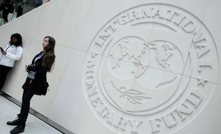 IMF hạ dự báo tăng trưởng toàn cầu - Ảnh 1. IMF hạ dự báo tăng trưởng toàn cầu - Ảnh 1.