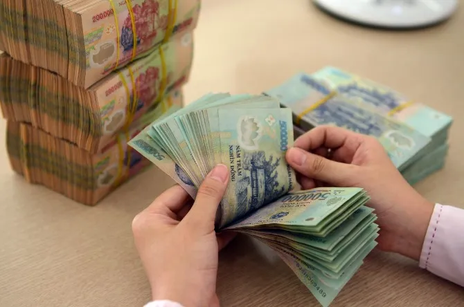 Lãi suất điều hành giảm: Cơ sở để các ngân hàng hạ lãi vay - Ảnh 1. Lãi suất điều hành giảm: Cơ sở để các ngân hàng hạ lãi vay - Ảnh 1.