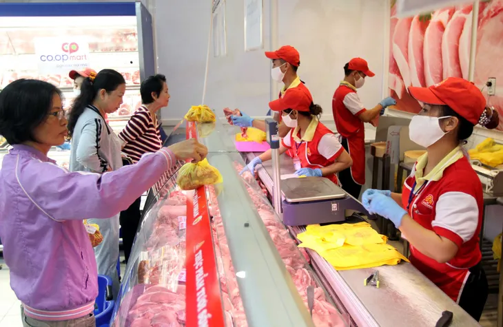 Doanh nghiệp tham gia bình ổn được giữ nguyên lãi suất vay - Ảnh 1. Doanh nghiệp tham gia bình ổn được giữ nguyên lãi suất vay - Ảnh 1.