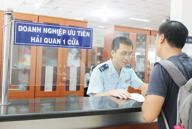 60% doanh nghiệp hài lòng với cơ chế 1 cửa quốc gia - Ảnh 1. 60% doanh nghiệp hài lòng với cơ chế 1 cửa quốc gia - Ảnh 1.