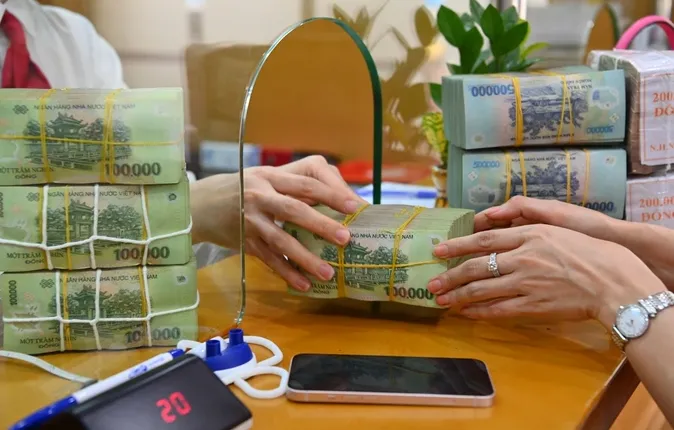Tín dụng tăng trưởng chậm nhất 10 năm - Ảnh 1. Tín dụng tăng trưởng chậm nhất 10 năm - Ảnh 1.
