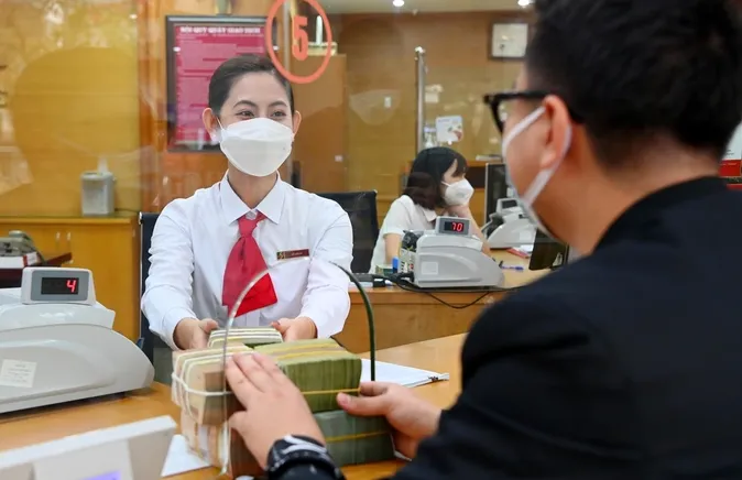 Ngân hàng đẩy mạnh tín dụng cuối năm - Ảnh 1. Ngân hàng đẩy mạnh tín dụng cuối năm - Ảnh 1.