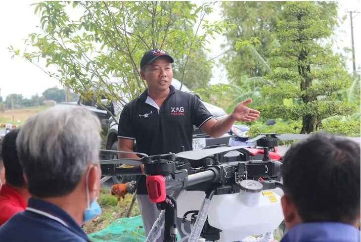 Drone XAG cùng nông dân trồng lúa Việt Nam gia tăng thu nhập - Ảnh 1. Drone XAG cùng nông dân trồng lúa Việt Nam gia tăng thu nhập - Ảnh 1.