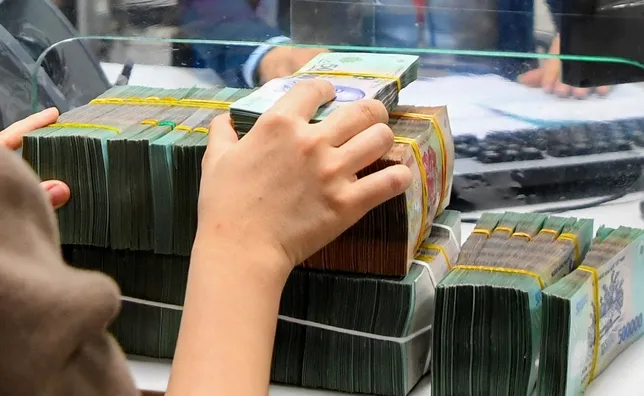 Ưu tiên ổn định mặt bằng lãi suất và tỷ giá - Ảnh 1. Ưu tiên ổn định mặt bằng lãi suất và tỷ giá - Ảnh 1.