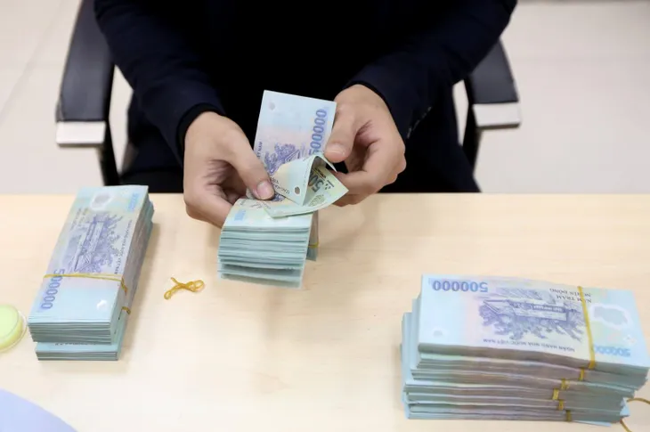 Ngân hàng thương mại tăng giảm lãi suất phải báo cáo Ngân hàng Nhà nước - Ảnh 1. Ngân hàng thương mại tăng giảm lãi suất phải báo cáo Ngân hàng Nhà nước - Ảnh 1.