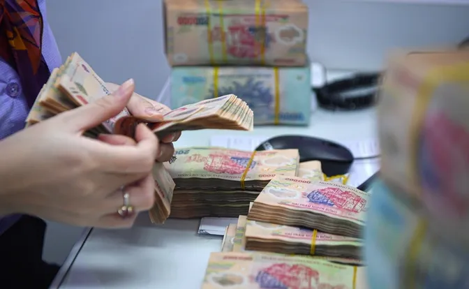 Làn sóng giảm lãi suất cho vay dịp cuối năm - Ảnh 1. Làn sóng giảm lãi suất cho vay dịp cuối năm - Ảnh 1.