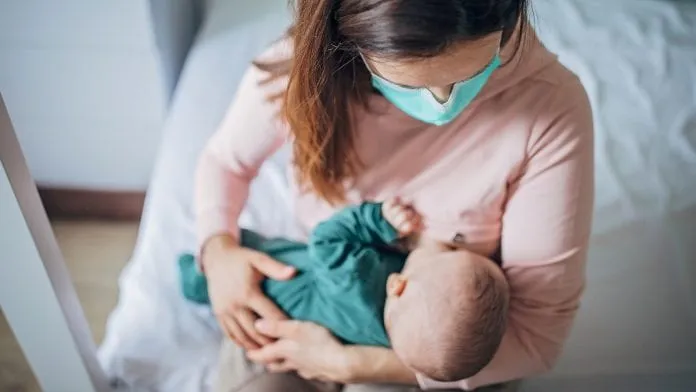Mẹ là F0 điều trị tại nhà cho con bú thế nào? - Ảnh 2. Mẹ là F0 điều trị tại nhà cho con bú thế nào? - Ảnh 2.
