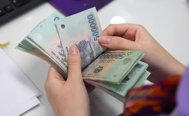 Tăng lương tối thiểu vùng: Doanh nghiệp lo nhưng vẫn ủng hộ - Ảnh 1. Tăng lương tối thiểu vùng: Doanh nghiệp lo nhưng vẫn ủng hộ - Ảnh 1.