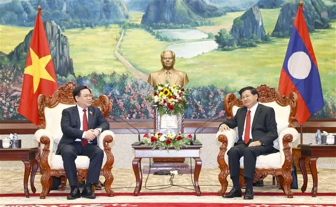 Tăng cường quan hệ hữu nghị vĩ đại Việt Nam - Lào - Ảnh 2. Tăng cường quan hệ hữu nghị vĩ đại Việt Nam - Lào - Ảnh 2.