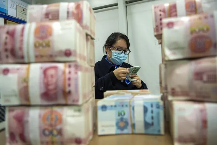 Goldman Sachs hạ dự báo tăng trưởng kinh tế Trung Quốc - Ảnh 1. Goldman Sachs hạ dự báo tăng trưởng kinh tế Trung Quốc - Ảnh 1.