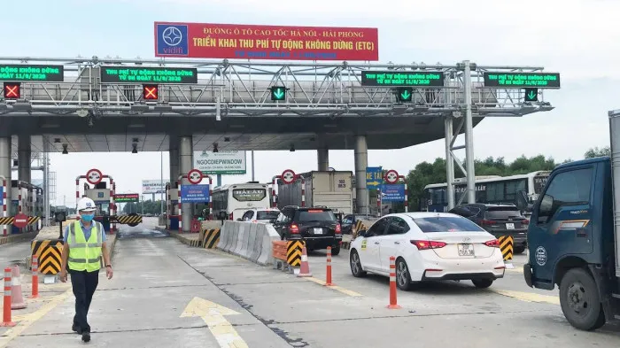 Thu phí không dừng “chạy nước rút” - Ảnh 2. Thu phí không dừng “chạy nước rút” - Ảnh 2.