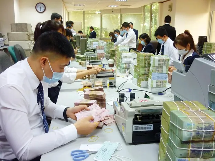 Nỗ lực ổn định mặt bằng lãi suất - Ảnh 1. Nỗ lực ổn định mặt bằng lãi suất - Ảnh 1.