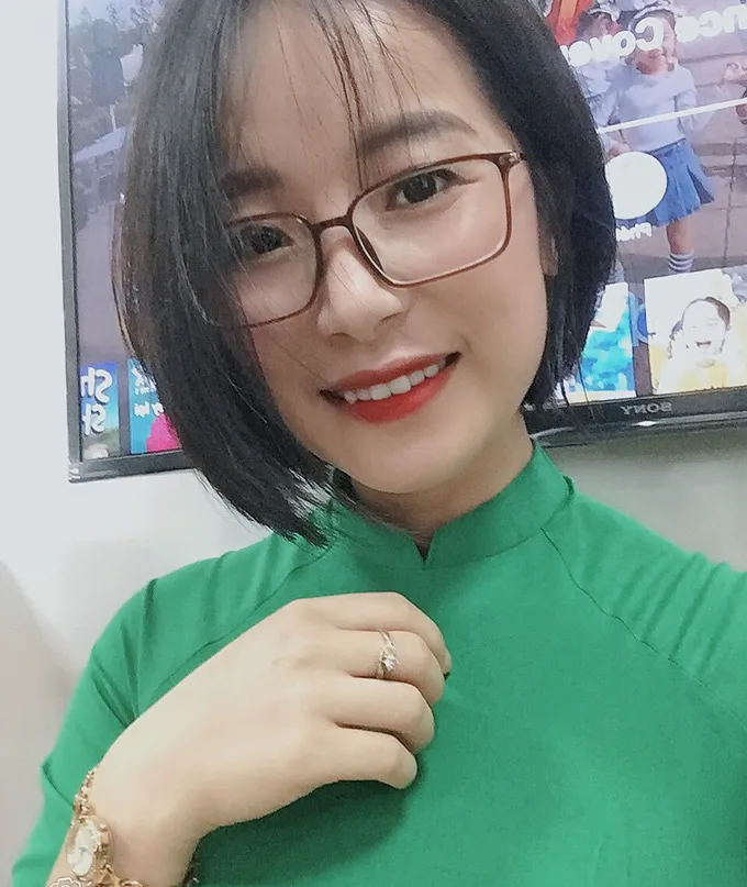 Cô giáo khuyết tật viết chữ đẹp như in bằng tay trái - Ảnh 2. Cô giáo khuyết tật viết chữ đẹp như in bằng tay trái - Ảnh 2.