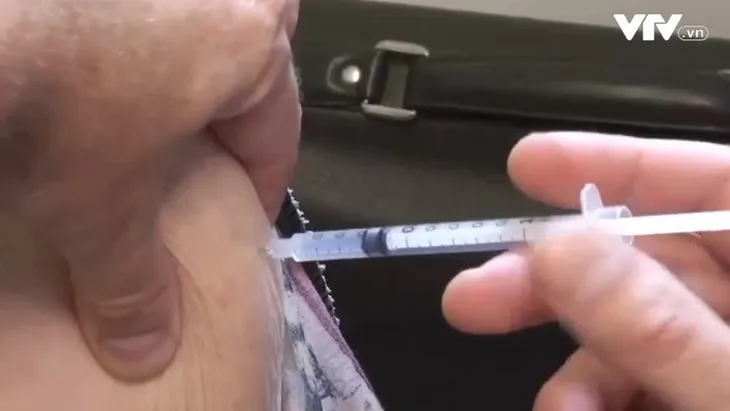 Bỉ thử nghiệm tiêm vaccine COVID-19 trong hiệu thuốc - Ảnh 1. Bỉ thử nghiệm tiêm vaccine COVID-19 trong hiệu thuốc - Ảnh 1.
