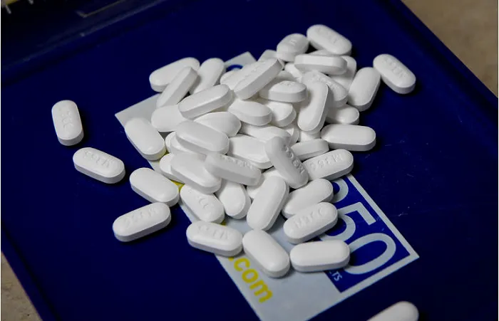 Ba hãng dược phẩm Mỹ thắng trong vụ kiện thuốc opioid ở Tây Virginia trị giá 2,5 tỷ USD - Ảnh 1. Ba hãng dược phẩm Mỹ thắng trong vụ kiện thuốc opioid ở Tây Virginia trị giá 2,5 tỷ USD - Ảnh 1.