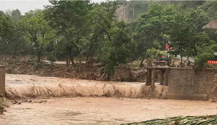 Lũ quét khiến ít nhất 4 người thiệt mạng tại Trung Quốc - Ảnh 1. Lũ quét khiến ít nhất 4 người thiệt mạng tại Trung Quốc - Ảnh 1.