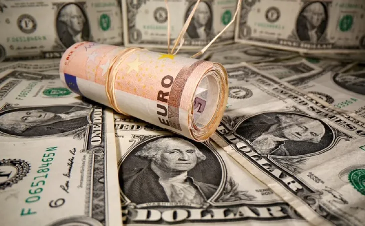 USD mạnh, Euro yếu: Ai lợi, ai thiệt? - Ảnh 1. USD mạnh, Euro yếu: Ai lợi, ai thiệt? - Ảnh 1.