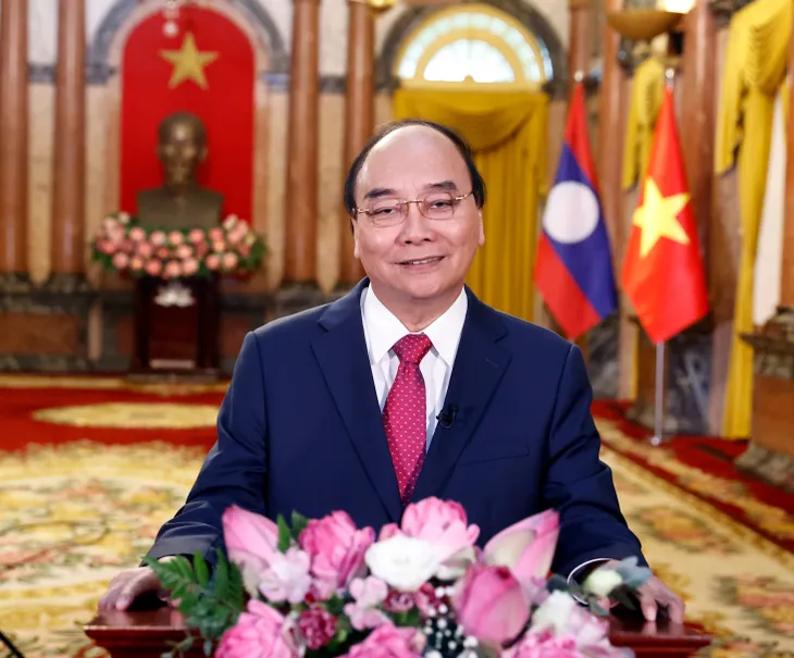 Chủ tịch nước: Mối quan hệ Việt Nam - Lào sẽ tiếp tục nở hoa thơm, kết trái ngọt - Ảnh 1. Chủ tịch nước: Mối quan hệ Việt Nam - Lào sẽ tiếp tục nở hoa thơm, kết trái ngọt - Ảnh 1.