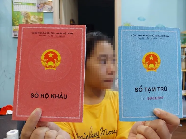 Bỏ sổ hộ khẩu giấy: Thủ tục hành chính giải quyết nhanh gọn - Ảnh 1. Bỏ sổ hộ khẩu giấy: Thủ tục hành chính giải quyết nhanh gọn - Ảnh 1.