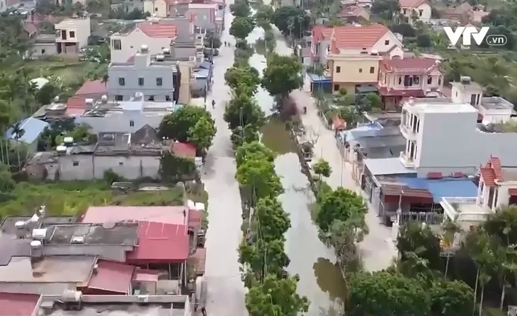 Giáo dân hiến đất làm đường xây dựng nông thôn mới - Ảnh 1. Giáo dân hiến đất làm đường xây dựng nông thôn mới - Ảnh 1.