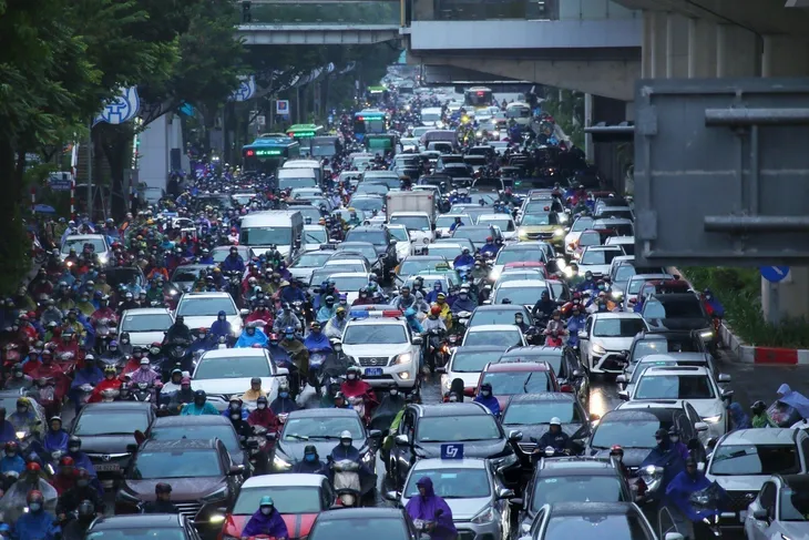 Hà Nội: Mưa rét kèm tắc đường trong ngày đầu tuần - Ảnh 5. Hà Nội: Mưa rét kèm tắc đường trong ngày đầu tuần - Ảnh 5.