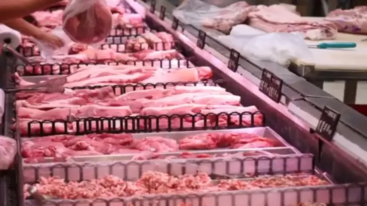 Nguy cơ giảm phát tại Trung Quốc do giá thịt giảm - Ảnh 1. Nguy cơ giảm phát tại Trung Quốc do giá thịt giảm - Ảnh 1.