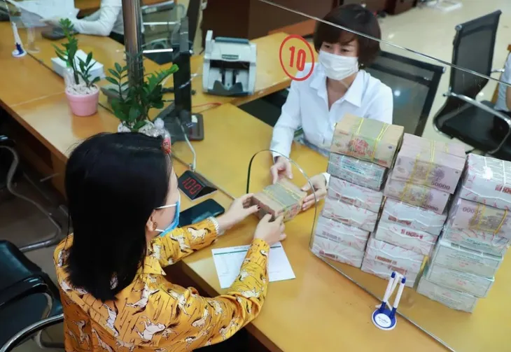 Gỡ khó hạn mức tín dụng để khơi thông dòng vốn - Ảnh 1. Gỡ khó hạn mức tín dụng để khơi thông dòng vốn - Ảnh 1.
