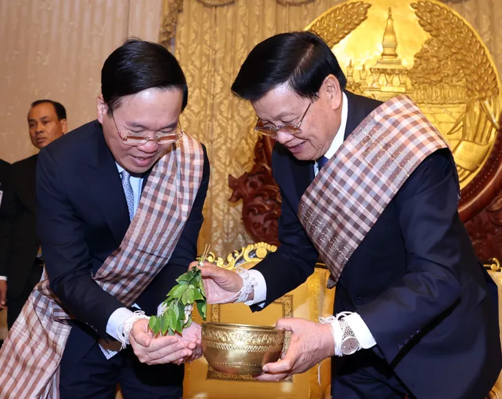 Chủ tịch nước Võ Văn Thưởng dự Lễ buộc chỉ cổ tay tại Lào - Ảnh 4. Chủ tịch nước Võ Văn Thưởng dự Lễ buộc chỉ cổ tay tại Lào - Ảnh 4.