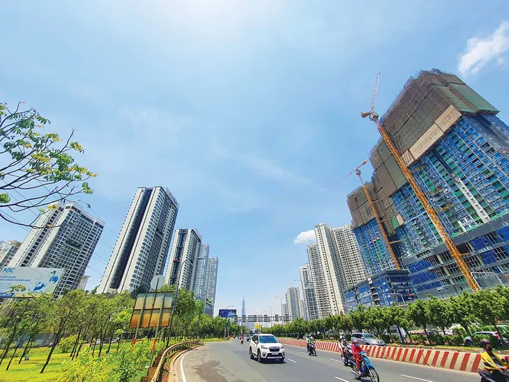 Thị trường bất động sản “ấm” lên - Ảnh 1.