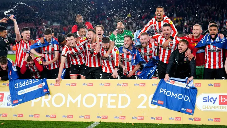 Sheffield United trở lại Ngoại hạng Anh sau 3 năm - Ảnh 1. Sheffield United trở lại Ngoại hạng Anh sau 3 năm - Ảnh 1.
